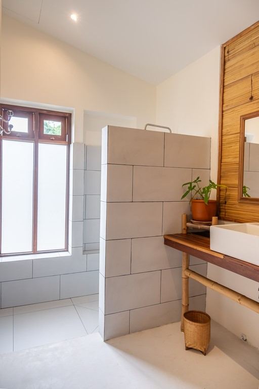 An en-suite rain-shower bathroom in one of the Nests