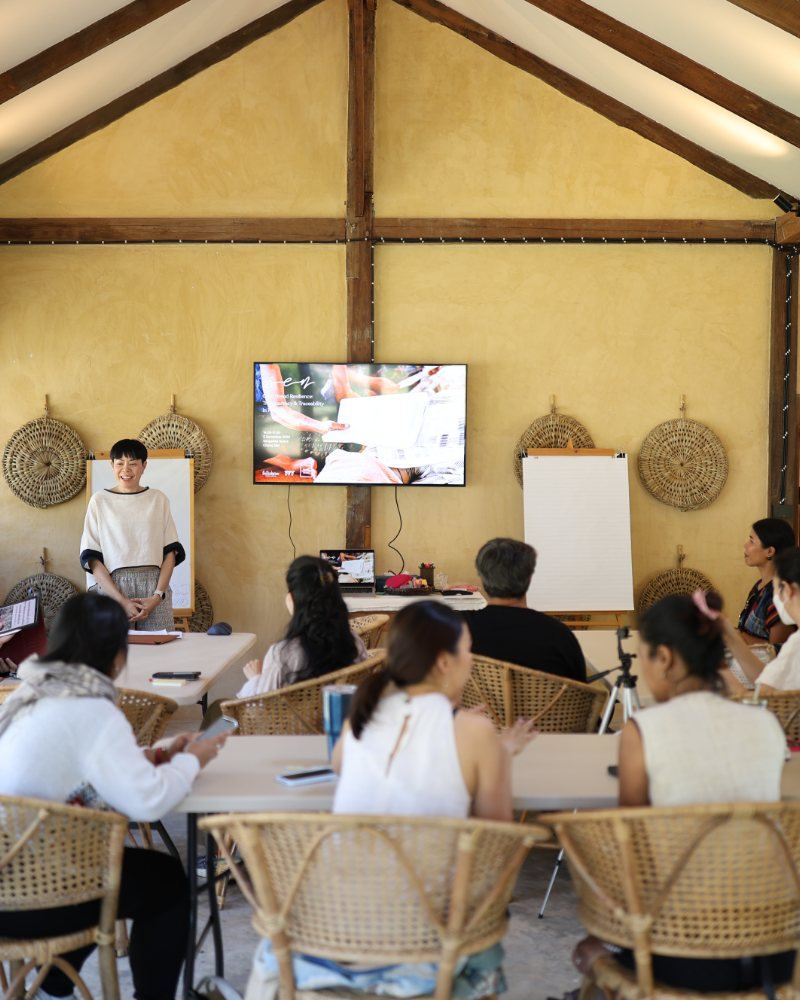 A SEN talk inside the earthen hall