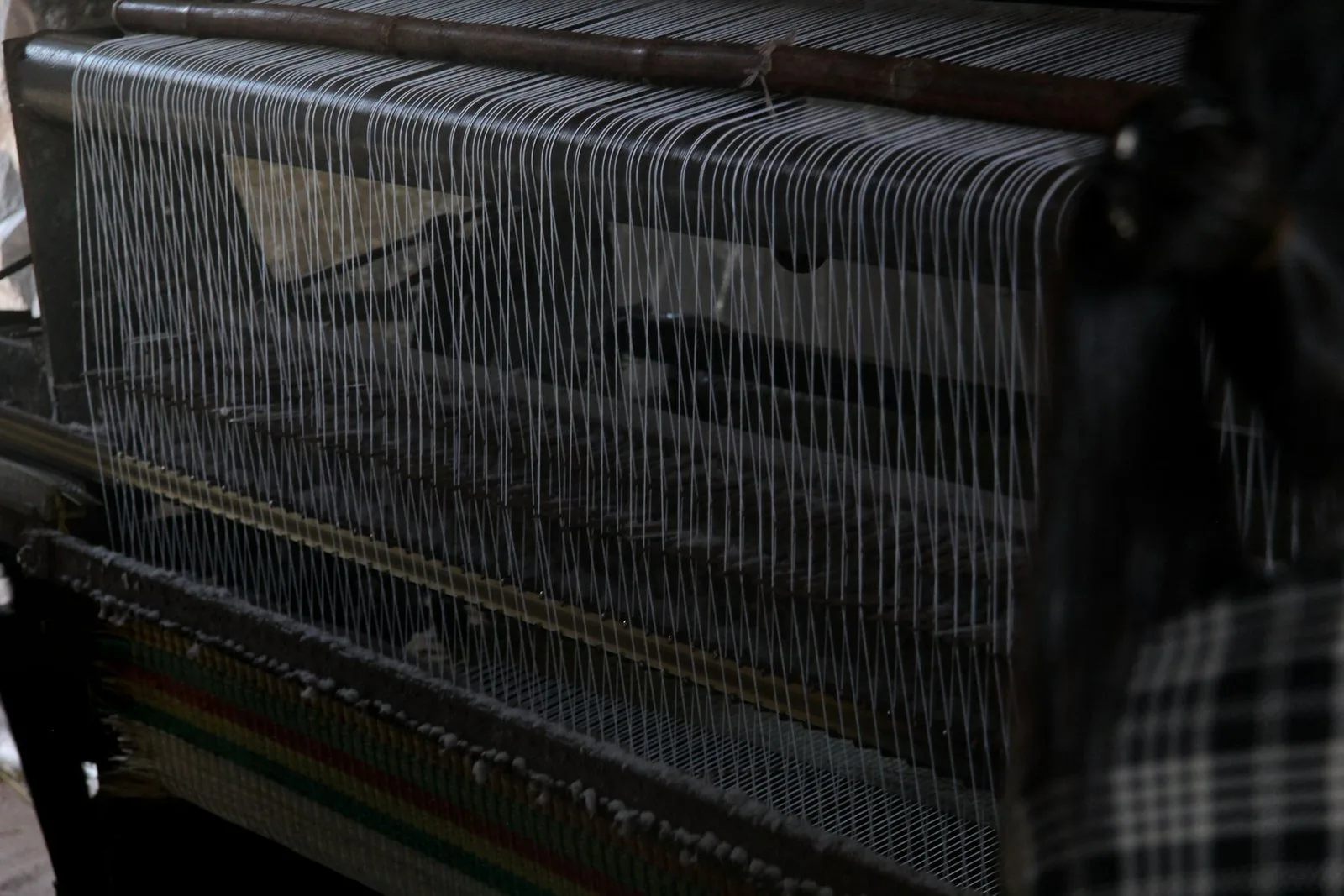 Threads on a wooden handloom